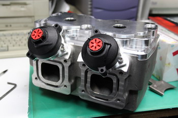 >Crazy House billet power valve cylinder