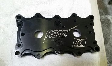 >Kommander SJ head Motz signature