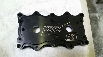 >Kommander SJ head Motz signature